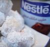 nestle sweetened condensed milk next to a plate of desserts