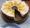 Chocolate cake topped with orange slices